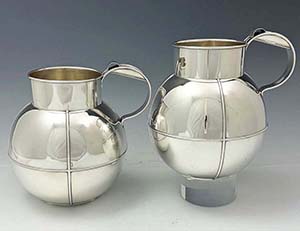 Gorham pair of modernist sterling pitchers